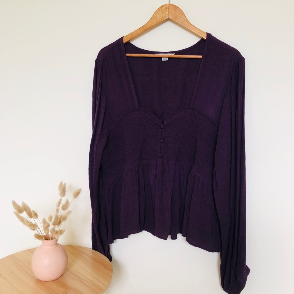 Purple long sleeved blouse corset detailing
